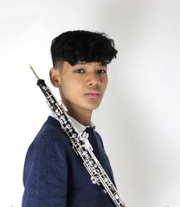 oboe player holding oboe